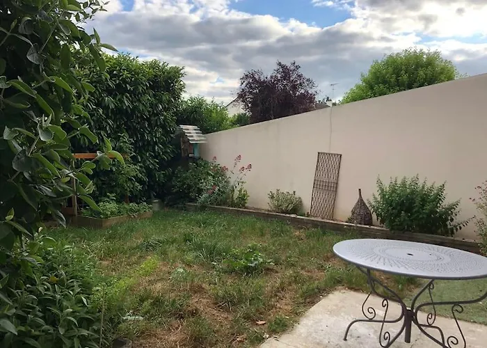 Appartement En Duplex Avec Parking Et Jardinet