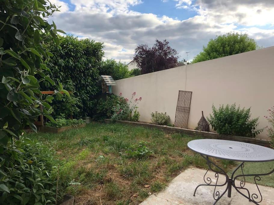 Appartement En Duplex Avec Parking Et Jardinet Bourges